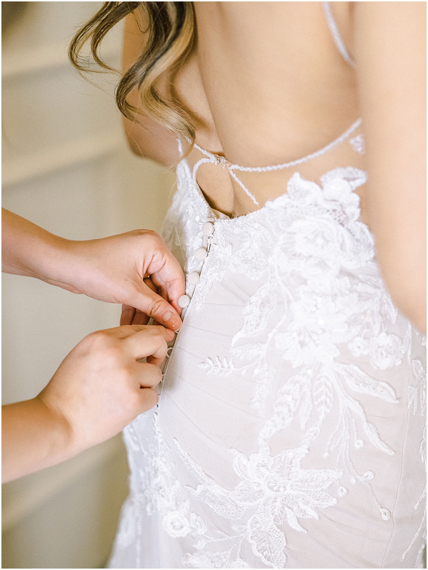 Bride and groom embrace at Khrya Beaucrest Ranch with mountain views