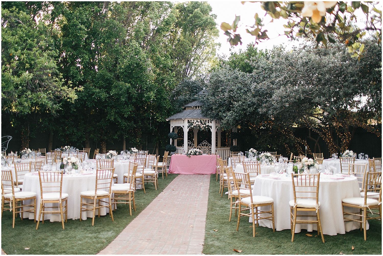 Dusty pink and ivory wedding decor at Christmas House Inn LGBTQ+ wedding.