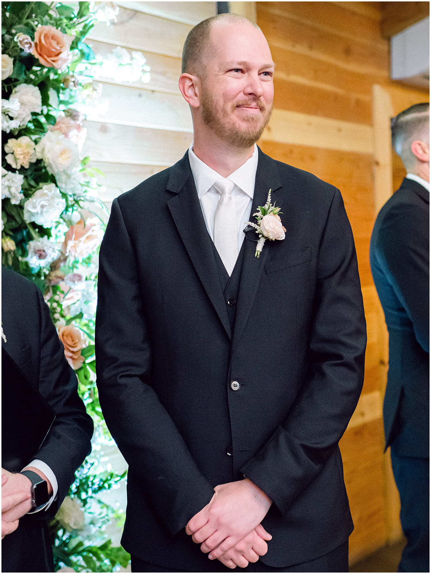 Elegant mountain wedding ceremony at Serendipity Garden with soft winter florals.