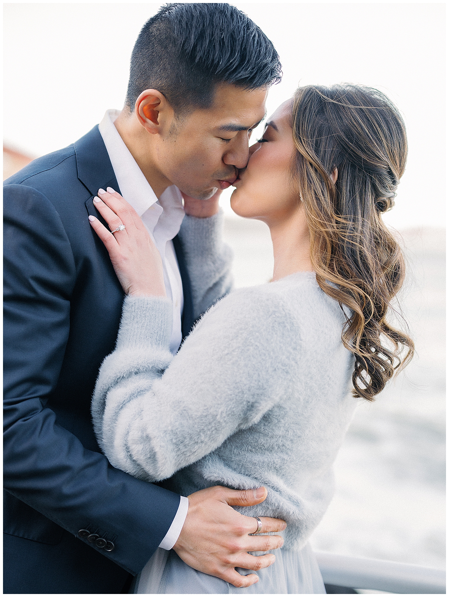 Romantic San Francisco engagement photo in front of the Golden Gate Bridge at Crissy Field.