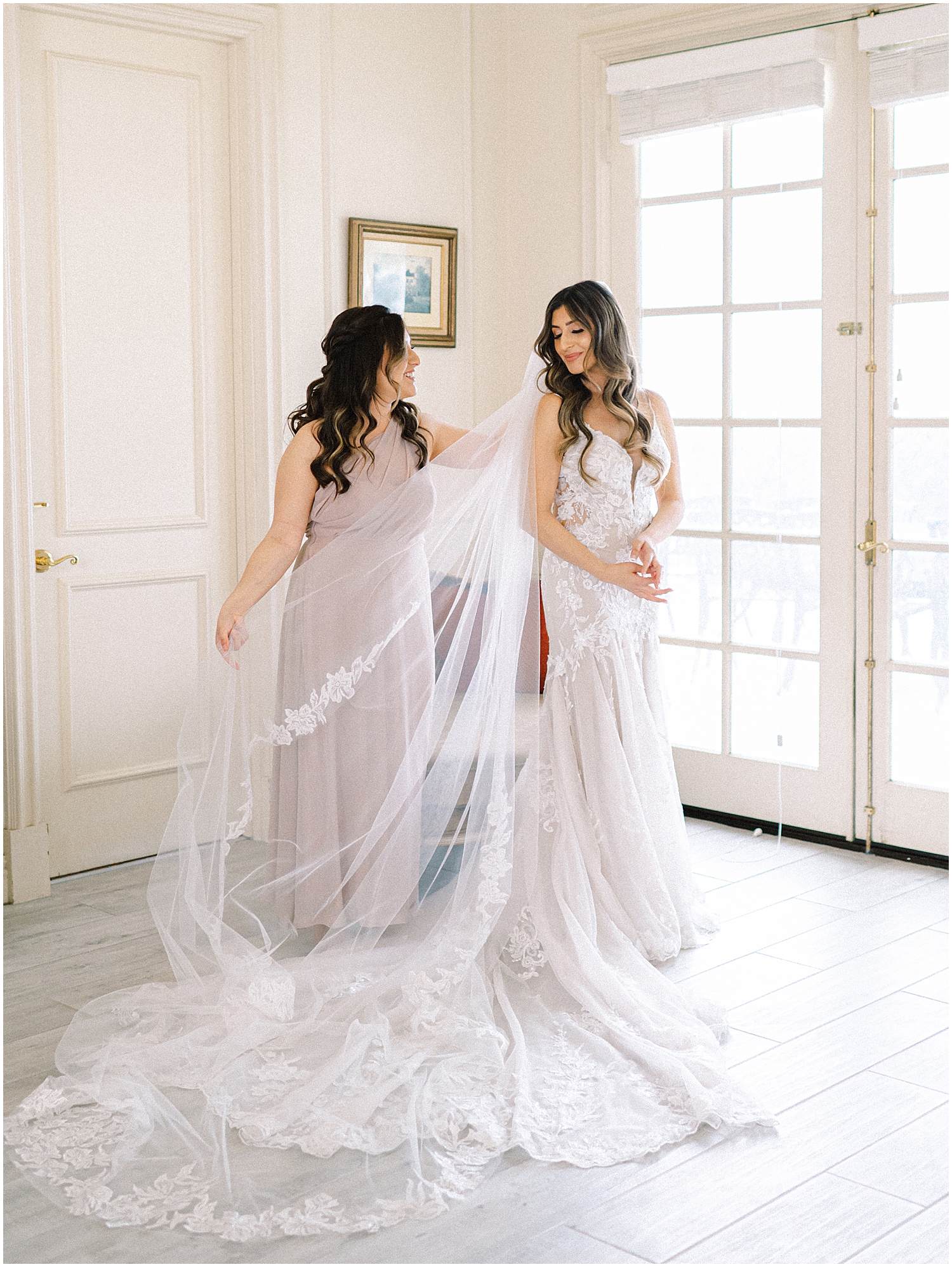 Bride and groom embrace at Khrya Beaucrest Ranch with mountain views