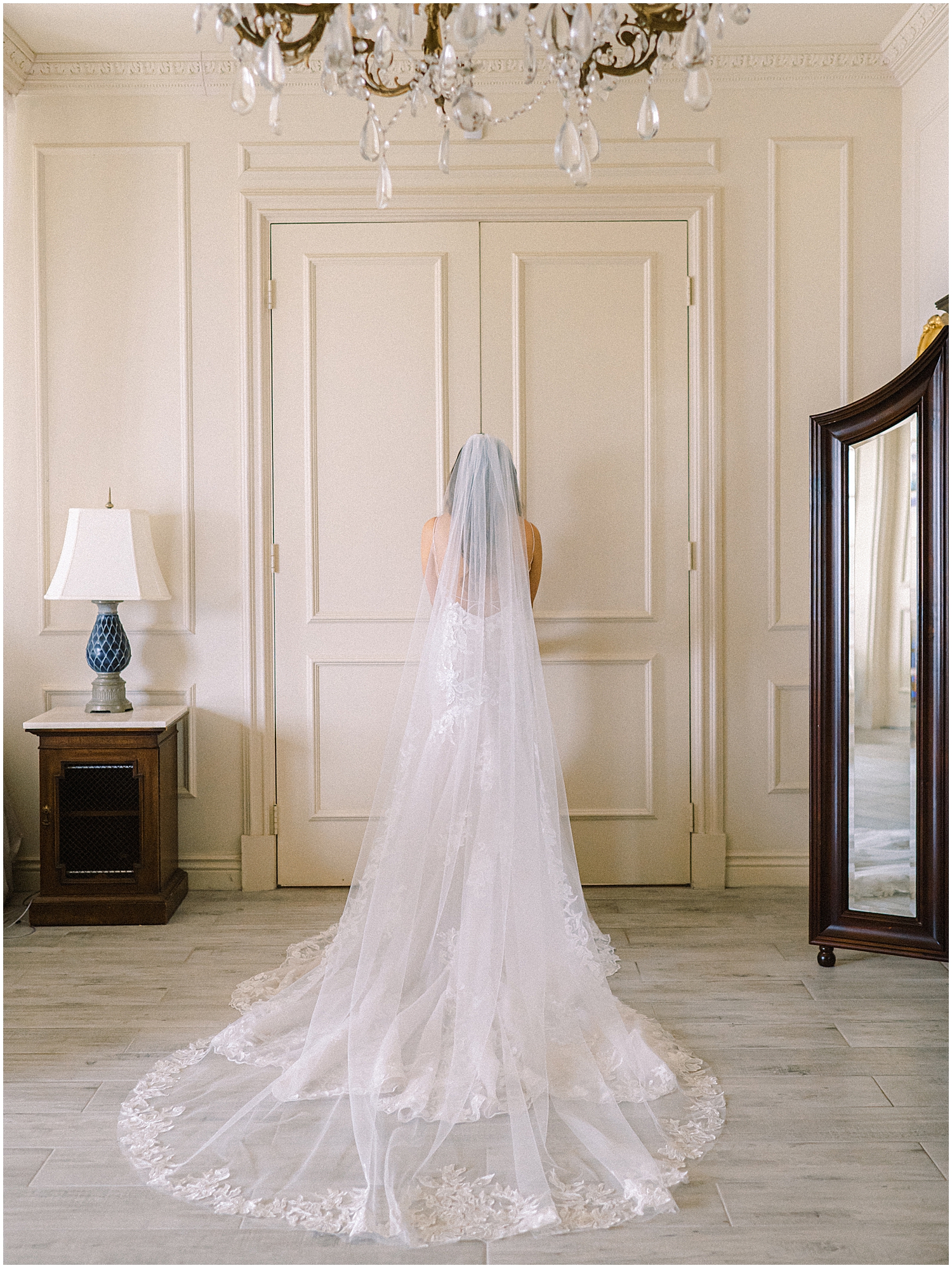 Bride and groom embrace at Khrya Beaucrest Ranch with mountain views