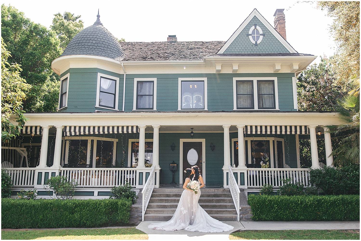 Bride and bride portraits in the scenic gardens of Christmas House Inn.